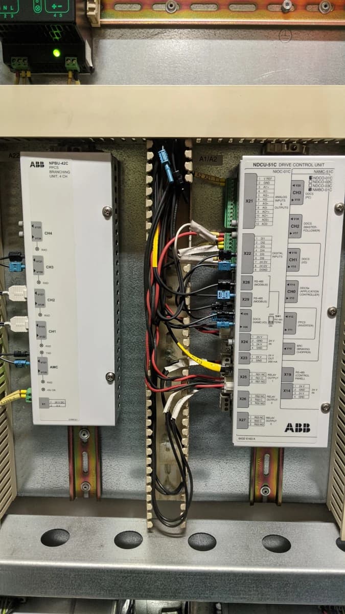 Engineer performing electrical diagnostics on azimuth drive IGBT power module — ACS600 fault analysis Ashmit Engineering